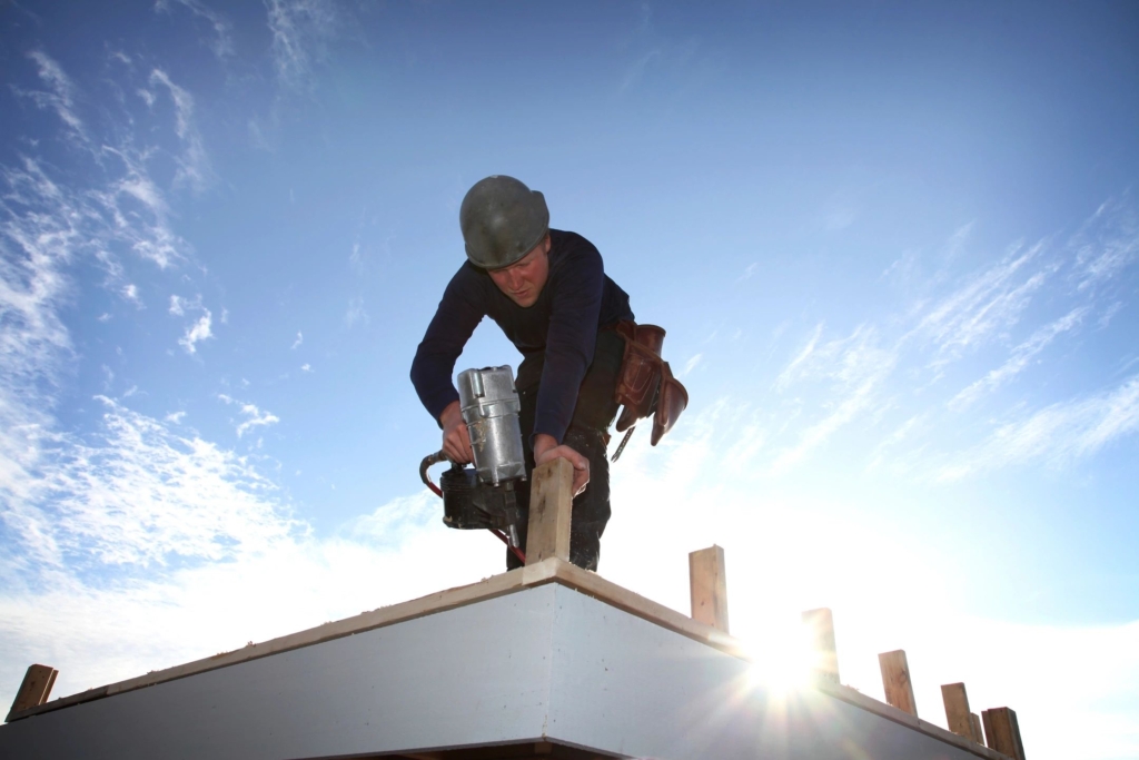 Man fixing a roof